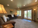 Living den with doors to the outside patio